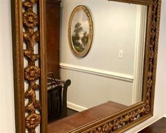 Vintage Hollywood Regency floral scroll mirror