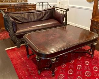 Metal frame sofa with leather cushions and vintage Art Deco wood inlay coffee table