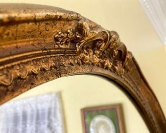 Vintage Hollywood Regency oval mirror