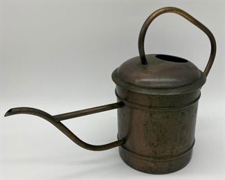 Vintage brass watering can