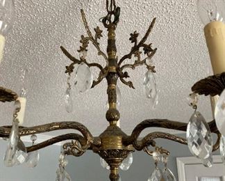 Vintage flower and vine brass candelabra with crystals