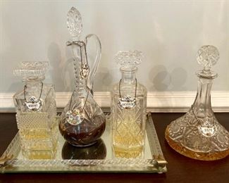 Vintage cut glass decanters and pitcher