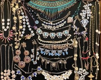 Lots of upscale and elegant costume jewelry; necklaces, rings, earrings, bracelets, brooches
