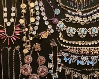 Lots of upscale and elegant costume jewelry; necklaces, rings, earrings, bracelets, brooches