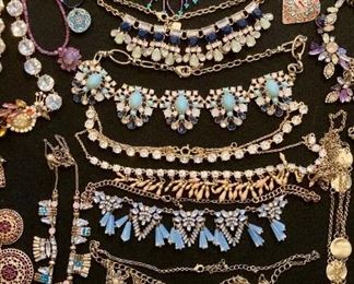 Lots of upscale and elegant costume jewelry; necklaces, rings, earrings, bracelets, brooches