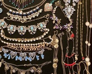 Lots of upscale and elegant costume jewelry; necklaces, rings, earrings, bracelets, brooches