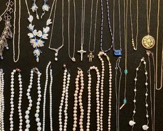 Lots of upscale and elegant costume jewelry; necklaces, rings, earrings, bracelets, brooches