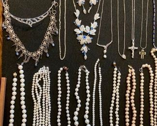 Lots of upscale and elegant costume jewelry; necklaces, rings, earrings, bracelets, brooches