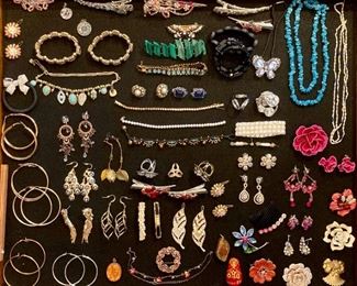 Lots of upscale and elegant costume jewelry; necklaces, rings, earrings, bracelets, brooches