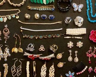 Lots of upscale and elegant costume jewelry; necklaces, rings, earrings, bracelets, brooches