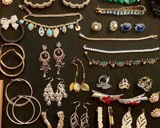 Lots of upscale and elegant costume jewelry; necklaces, rings, earrings, bracelets, brooches