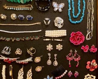 Lots of upscale and elegant costume jewelry; necklaces, rings, earrings, bracelets, brooches