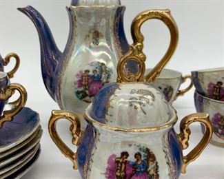 Vintage Lusterware Demitasse musical set; 6 cups with saucers, creamer, sugar and musical teapot