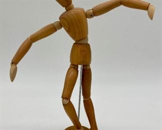 Wooden figure-in-motion