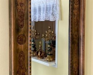 Vintage leather framed gilt accented mirror