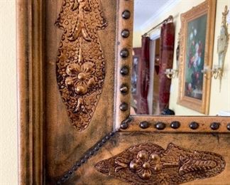 Vintage leather framed gilt accented mirror