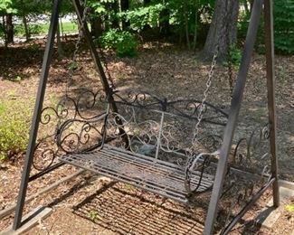 Iron swinging bench with frame