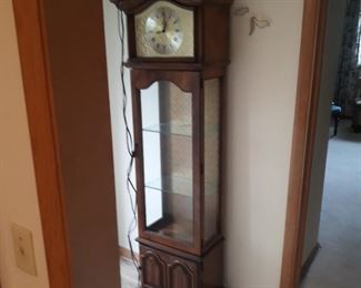 Electric clock  and curio cabinet