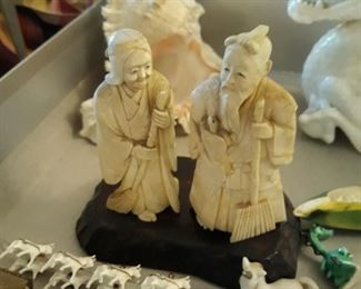 Carved bone asian figurines 