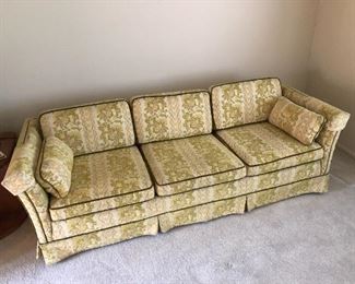 Retro sofa with green velvet welting. Great condition for age.