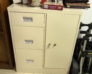 Locking metal file with safe.