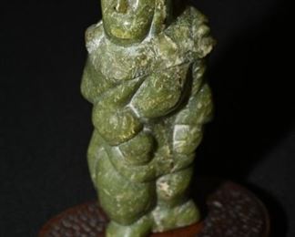 Jade carved man with baby on wood base