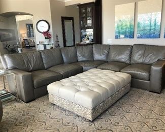 Grey leather sectional
- original
Price 25,000 now $5,000 - it is located in Scripps Ranch.  This will require a special pick up situation - please text me