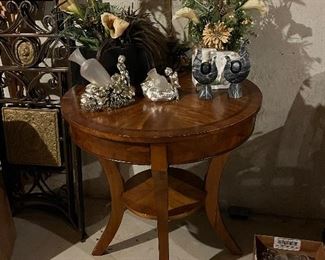Round wood occasional table and decor