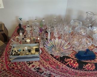antique and vintage perfume bottles, cut crystal vases, footed compote dishes.