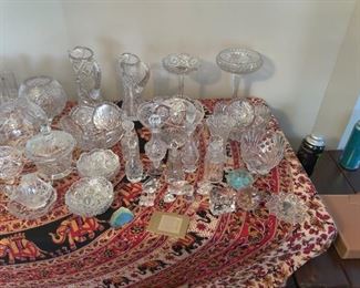 Cut crystal bowls, decanter bottles, footed compote dishes, candy dishes 