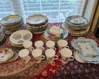 vintage coffee cups, ceramic serving trays, various plates 