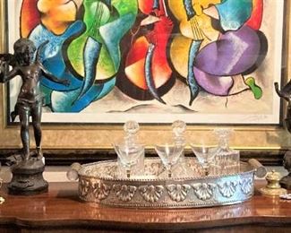Brass candelabras; bronze statues; serving tray
