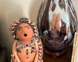 A Storyteller Doll is a clay figurine made by the Pueblo people of New Mexico. The first contemporary storyteller was made by Helen Cordero of the Cochiti Pueblo in 1964 in honor of her grandfather, Santiago Quintana, who was a tribal storyteller.