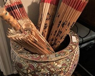 One of several Asian fish bowls/planters;  Asian umbrellas 