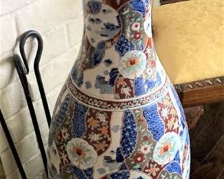 One of two large Asian vases/urns