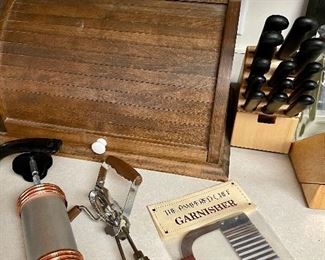 bread box, hand mixer, Pampered Chef garnisher, knife set