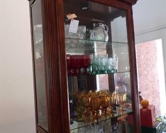 curio cabinet w/colored glassware