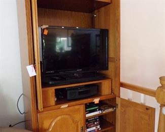 entertainment center, CD's, moves & VCR tapes