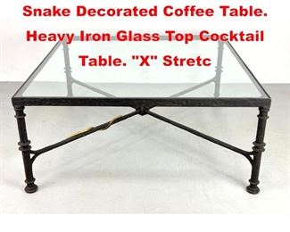 Lot 75 Diego Giacometti style Snake Decorated Coffee Table. Heavy Iron Glass Top Cocktail Table. X Stretc