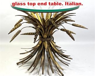 Lot 78 Gilt metal wheat sheaf table glass top end table. Italian. 