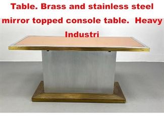 Lot 82 Art Deco Style Console Table. Brass and stainless steel mirror topped console table. Heavy Industri