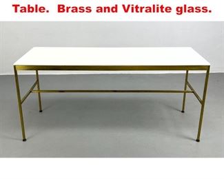 Lot 87 Paul McCobb Tall Coffee Table. Brass and Vitralite glass. 