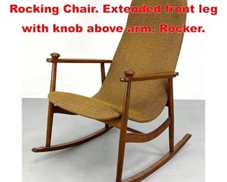 Lot 150 Modernist Open Arm Rocking Chair. Extended front leg with knob above arm. Rocker. 