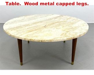 Lot 152 Travertine Top Coffee Table. Wood metal capped legs. 