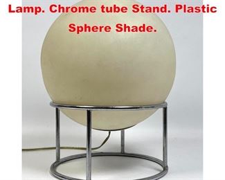 Lot 268 Modernist Ball Shade Lamp. Chrome tube Stand. Plastic Sphere Shade. 