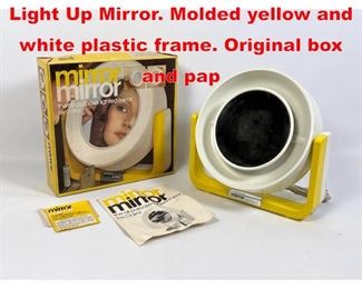 Lot 318 CLAIROL Mirror Mirror Light Up Mirror. Molded yellow and white plastic frame. Original box and pap