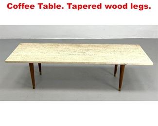 Lot 355 Italian Travertine Top Coffee Table. Tapered wood legs. 