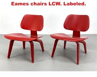 Lot 450 Pair of Red Herman Miller Eames chairs LCW. Labeled.