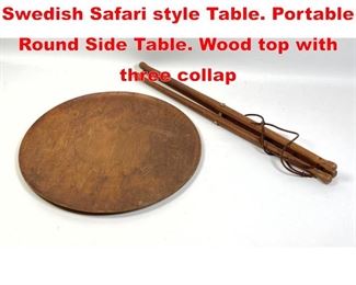 Lot 464 ARY FANERPRODUKTEI Swedish Safari style Table. Portable Round Side Table. Wood top with three collap
