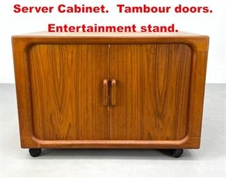 Lot 534 Danish Modern Teak rolling Server Cabinet. Tambour doors. Entertainment stand. 